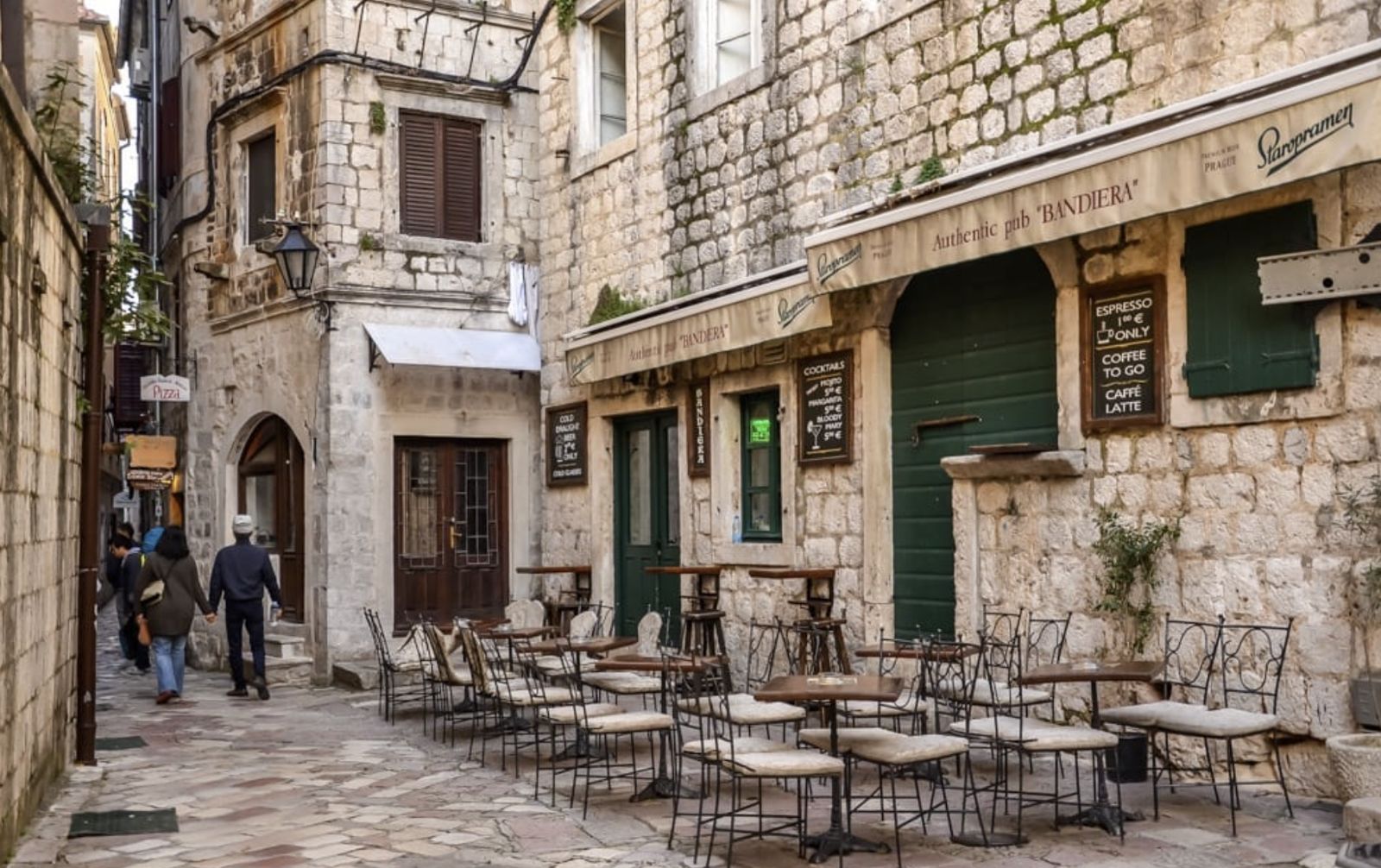 Café tables in a narrow street of Kotor old town